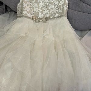Cream colored tulle and sequined dress.